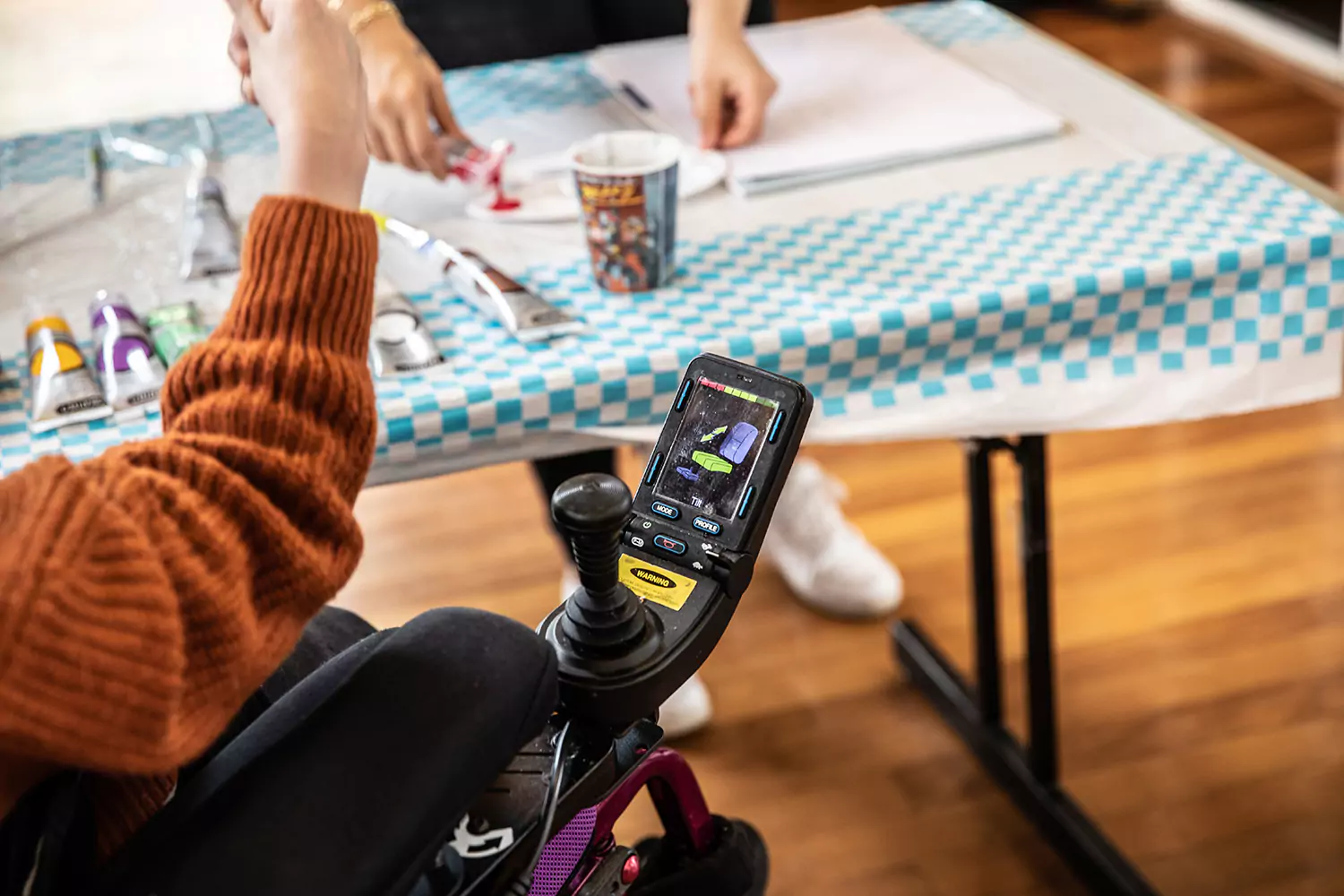 Close up of NDIS participant doing arts and crafts